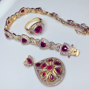 Gold plated bracelet, ring & matching pendant.